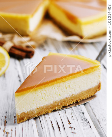 A piece of delicious caramel cheesecake 101014408