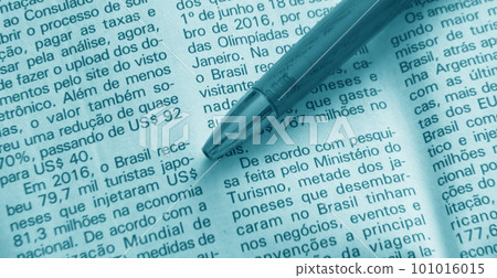 Foreign language newspaper and pen business image 101016015