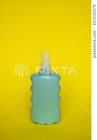 Blue blank unbranded cosmetic plastic bottle for shampoo, gel, lotion, cream, bath foam yellow background. Blue blank unbranded cosmetic plastic bottle for shampoo, gel, lotion, cream, bath foam yellow background. 101016378