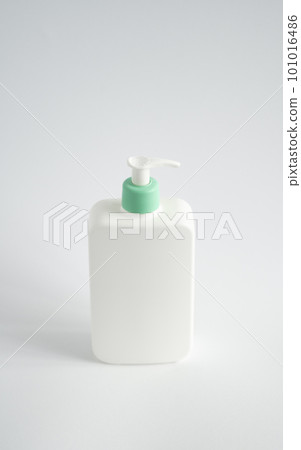 Large white plastic bottle with pump dispenser as a liquid container for gel, lotion, cream, shampoo, bath foam on white background. Large white plastic bottle with pump dispenser as a liquid container for gel, lotion, cream, shampoo, bath foam on white background. 101016486