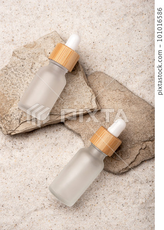 Glass bottles with a cosmetic product. Glass bottles with a cosmetic product. 101016586