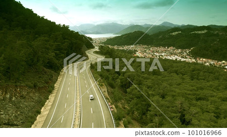 Aerial view of the modern winding road leading to the city of Marmaris, Turkey Aerial view of the modern winding road leading to the city of Marmaris, Turkey 101016966