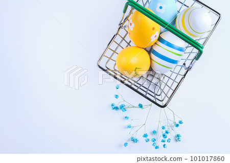 Easter eggs in a basket. Happy Easter Christian holiday. 101017860
