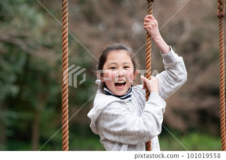 Girls playing in the park Girls playing in the park 101019558