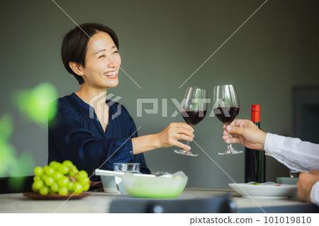 A couple dining at a restaurant A couple dining at a restaurant 101019810