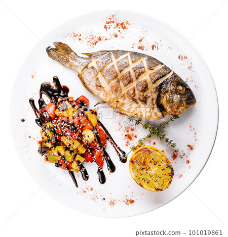 Grilled dorado fish with baked vegetables Grilled dorado fish with baked vegetables 101019861
