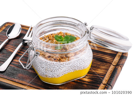 Chia pudding with exotic fruits and granola 101020390