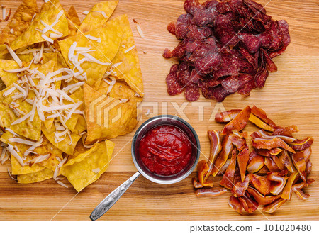 sujuk, smoked pork ears and mexican chips 101020480
