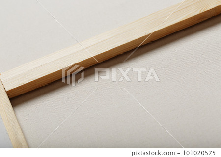 Canvas for artists stretched on a wooden rail, as a background Canvas for artists stretched on a wooden rail, as a background 101020575