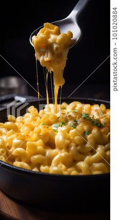 Mac and cheese. Classic American rustic mac and cheese. Golden baked macaroni with cheddar Mac and cheese. Classic American rustic mac and cheese. Golden baked macaroni with cheddar 101020884