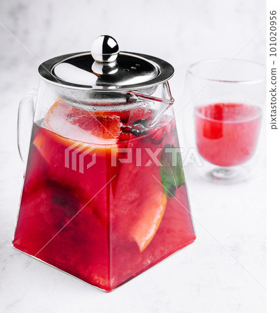 Strawberry, orange and basil sparkling punch, spring cocktail Strawberry, orange and basil sparkling punch, spring cocktail 101020956