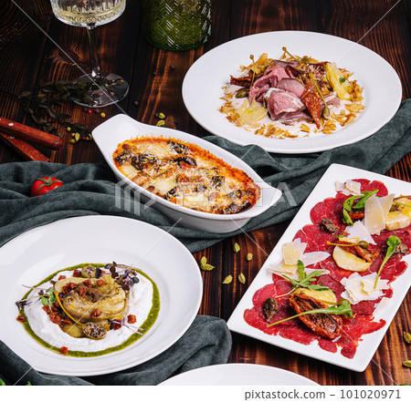 Carpaccio di manzo, Melanzane, Melanzana alla ricotta, Tar-tar with salmon and Vitello tonnato Carpaccio di manzo, Melanzane, Melanzana alla ricotta, Tar-tar with salmon and Vitello tonnato 101020971