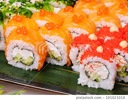 Big set of rolls with wasabi and pickled ginger Big set of rolls with wasabi and pickled ginger 101021018