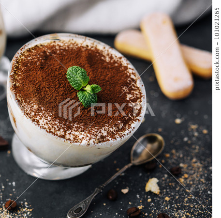 dessert tiramisu in glass close up dessert tiramisu in glass close up 101021265
