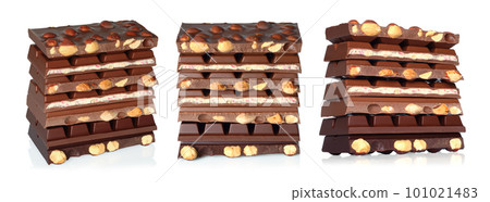 Set of Broken Chocolate Bars with Nuts, on white background Set of Broken Chocolate Bars with Nuts, on white background 101021483