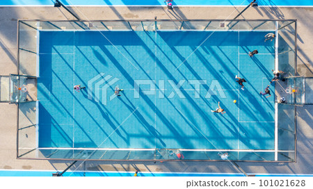 Aerial view of the city public basketball and football court. Aerial view of the city public basketball and football court. 101021628