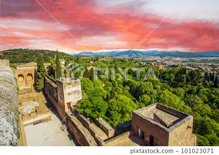 Idyllic panorama of Granada and part of the Alhambra fortress and nature with the snow-capped mountains of the Sierra Nevada Idyllic panorama of Granada and part of the Alhambra fortress and nature with the snow-capped mountains of the Sierra Nevada 101023071