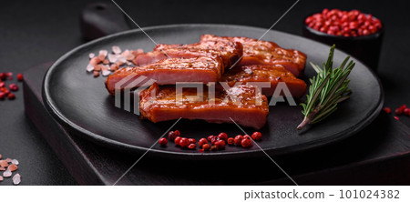 Grilled fresh juicy ribs with salt, spices and herbs Grilled fresh juicy ribs with salt, spices and herbs 101024382