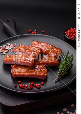Grilled fresh juicy ribs with salt, spices and herbs Grilled fresh juicy ribs with salt, spices and herbs 101024383