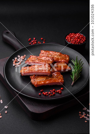 Grilled fresh juicy ribs with salt, spices and herbs Grilled fresh juicy ribs with salt, spices and herbs 101024386