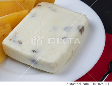 soft curd cheese with raisins and persimmons soft curd cheese with raisins and persimmons 101025921