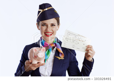smiling modern female flight attendant on white 101026491