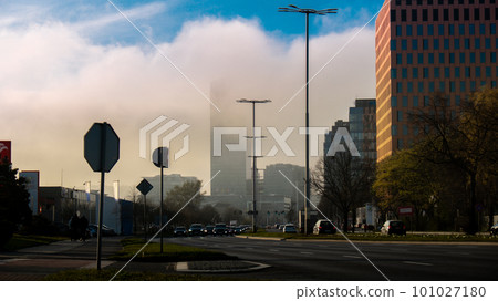 Clouds cover city sky tower skyscraper Public transport scene in Gdansk. Oliva business district Transport city traffic. Trams buses cars City Traffic Jam Clouds cover city sky tower skyscraper Public transport scene in Gdansk. Oliva business district Transport city traffic. Trams buses cars City Traffic Jam 101027180