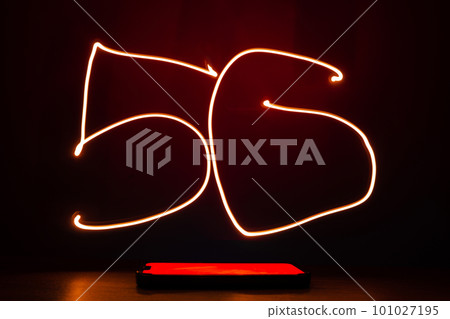 Abstract red lines long exposure light shape of 5G. Network internet mobile wireless Innovations in the future 5G cellular and Internet speeds. Abstract red lines long exposure light shape of 5G. Network internet mobile wireless Innovations in the future 5G cellular and Internet speeds. 101027195