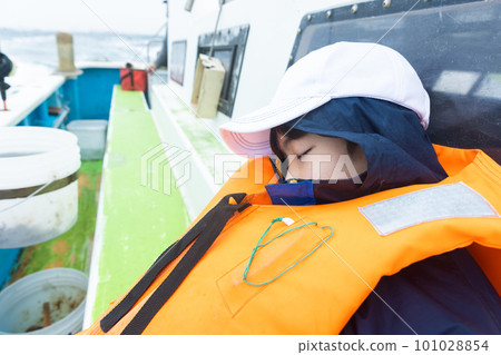 boy enjoying sea fishing 101028854