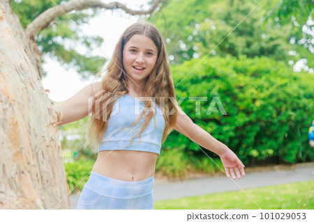 Sporty caucasian girl playing innocently Sporty caucasian girl playing innocently 101029053