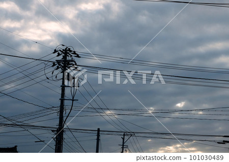 Morning light, clouds and electric wires Morning light, clouds and electric wires 101030489