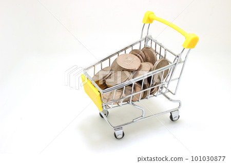 a shopping trolley with coins, isolated on white a shopping trolley with coins, isolated on white 101030877