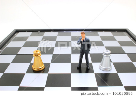 a businessmen standing Chess Analysis Communicate about business strategy a businessmen standing Chess Analysis Communicate about business strategy 101030895