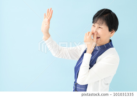 woman suffering from bad smell woman suffering from bad smell 101031335
