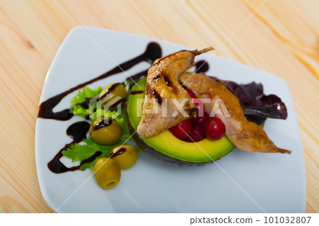 Roasted quail leg quarters with balsamic and vegetables Roasted quail leg quarters with balsamic and vegetables 101032807