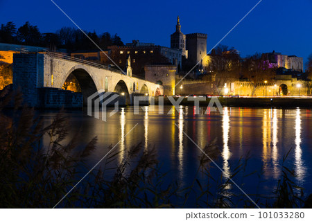 Pont St-Benezet, Palais des Papes and Rhone River at evening 101033280