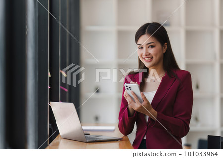 Beautiful Business woman completes KYC using an online banking program in order to open a digital savings account. The definition of cyber security 101033964