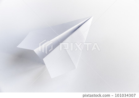 Paper plane origami isolated on a white background 101034307