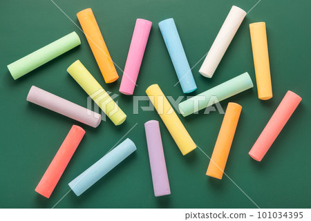 multicolor chalks like background over green 101034395