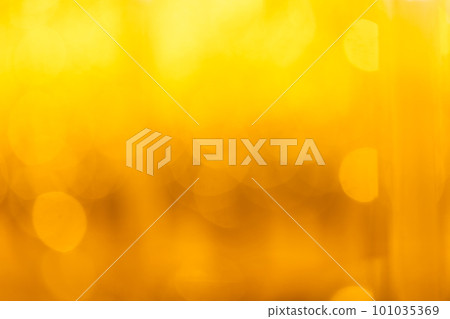 abstract photo of light gold, yellow abstract background with bokeh defocused lights. image is blurred and filtered 101035369