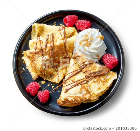 plate of freshly baked crepes plate of freshly baked crepes 101035396