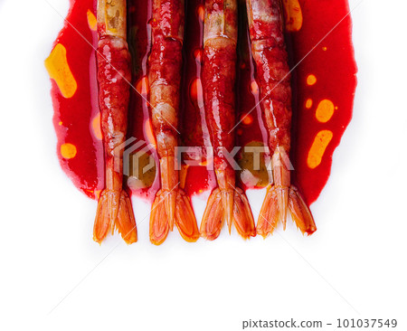 Grilled tiger prawns on a ceramic plate, top view Grilled tiger prawns on a ceramic plate, top view 101037549