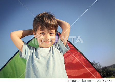 happy boy with kite 101037868