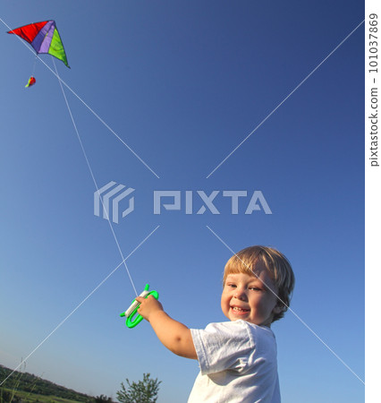 happy boy with kite 101037869