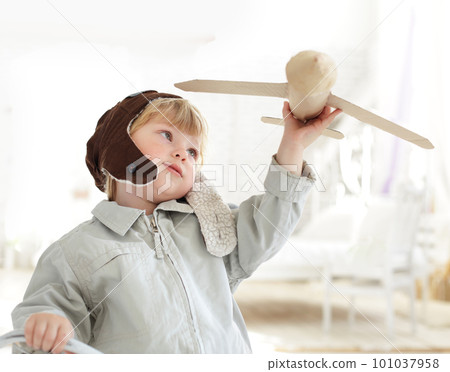 happy boy with airplane in hand happy boy with airplane in hand 101037958