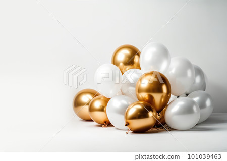 Gold and white balloon on white background with copy space. Gold and white balloon on white background with copy space. 101039463