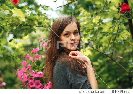 Portrait of smiling girl enjoying beauty treatment. Happy young woman 101039532