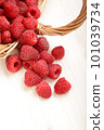 raspberry in a basket on the table 101039734