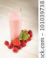 smoothie of berries on the table in the garden 101039738