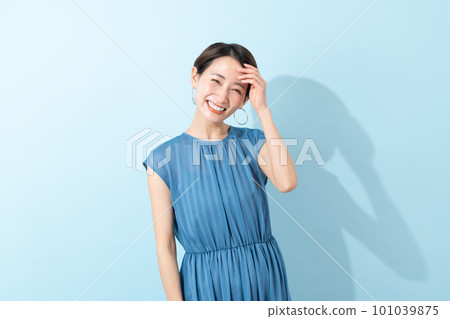 A woman wearing a dress (summer/beauty/ultraviolet) A woman wearing a dress (summer/beauty/ultraviolet) 101039875